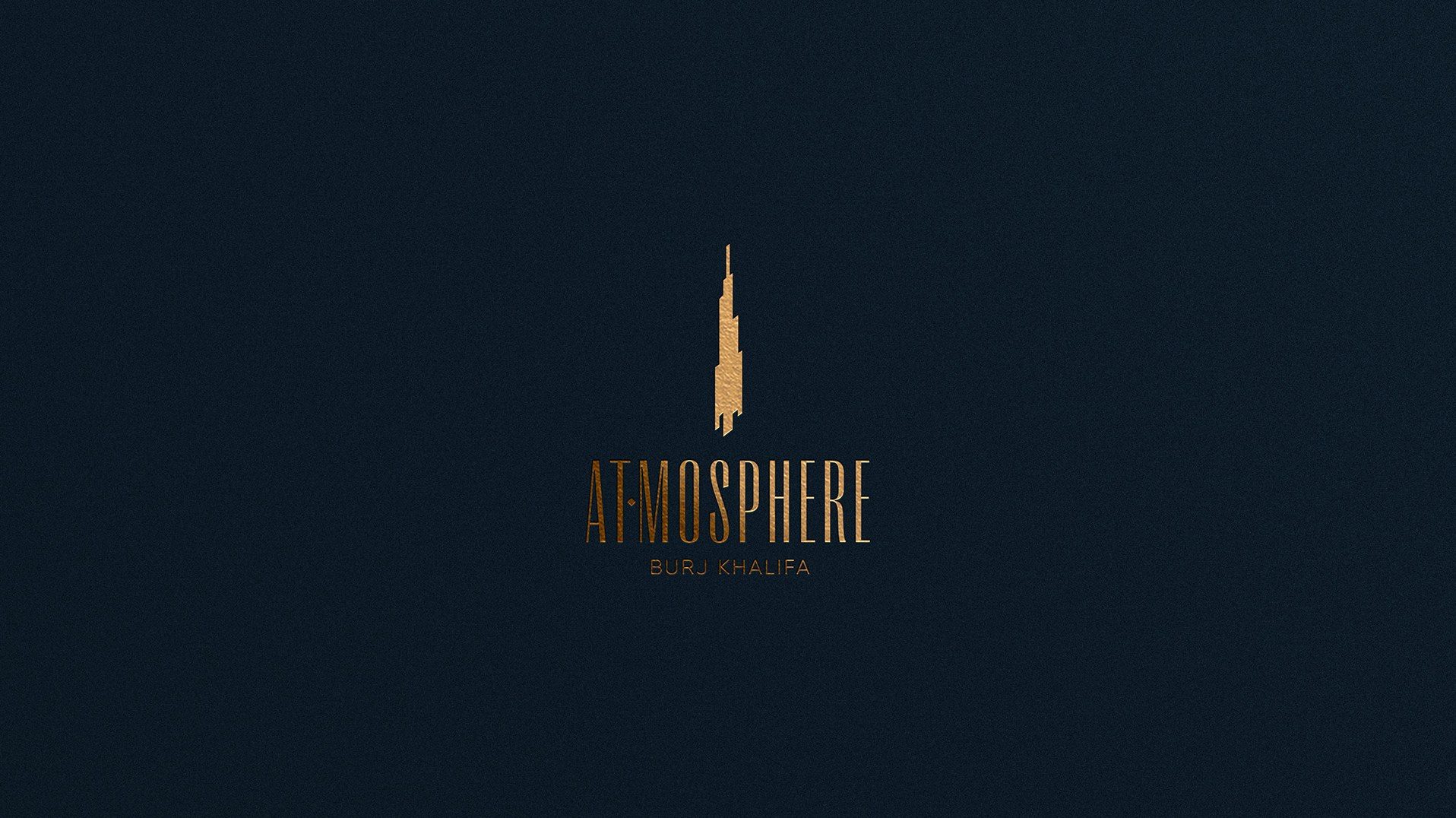 The At.mosphere gold logotype