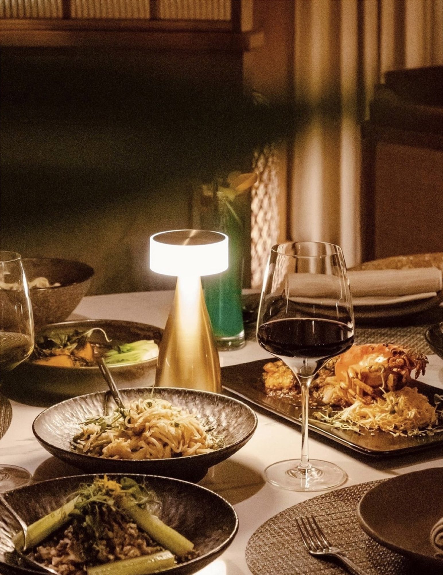 A Thiptara table setting at night