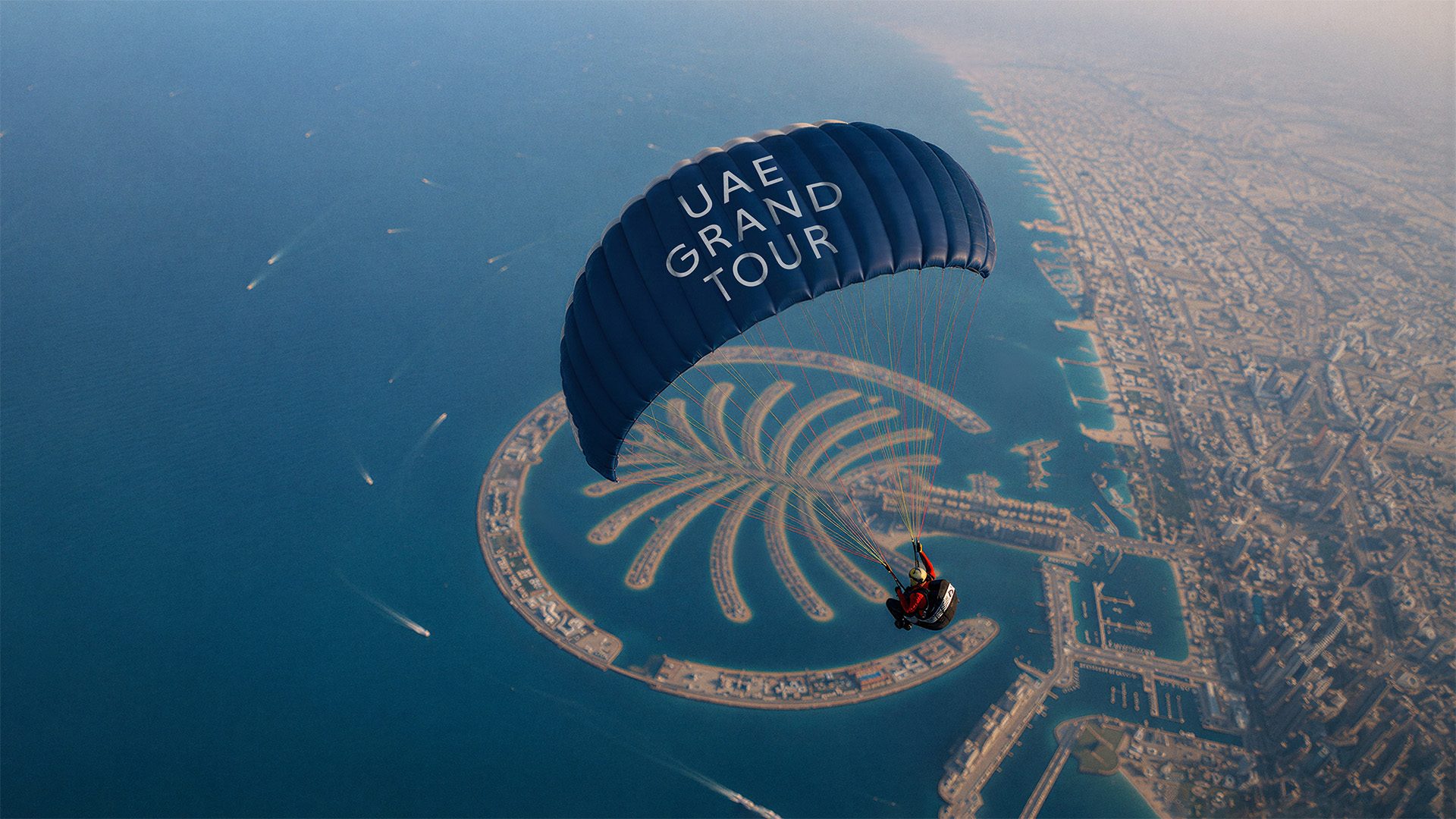The UAE Grand Tour identity introduced over Palm Jumeirah, Dubai